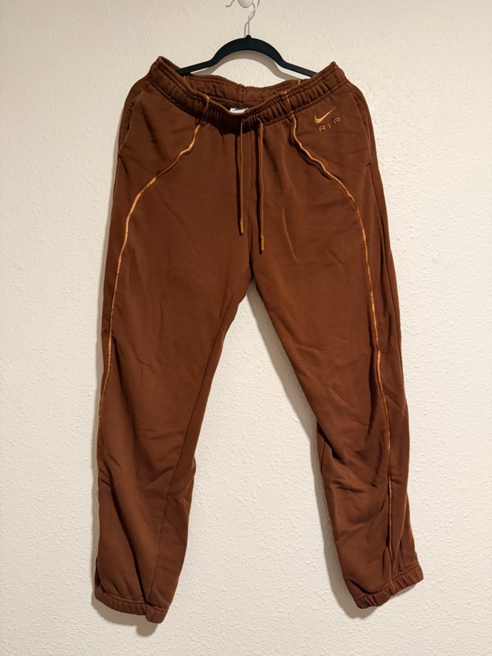 Nike Women's Brown Jogger Pants with Orange Contrast Stitching